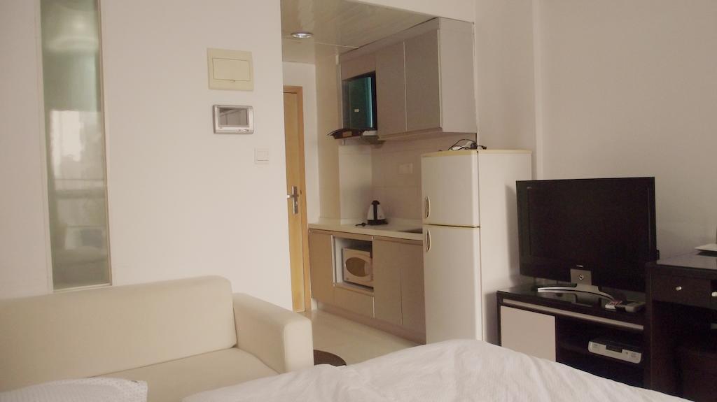 Guangzhou Happiness Apartment Rum bild