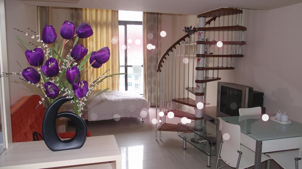 Guangzhou Happiness Apartment Rum bild
